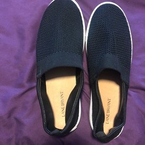 Women’s wide black mesh slip on